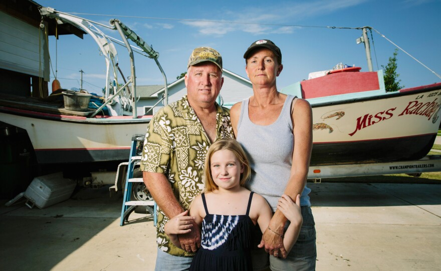 Raymond Gaspard, 54, and Tanya McCrory, 45, with their daughter Grace Gaspard.