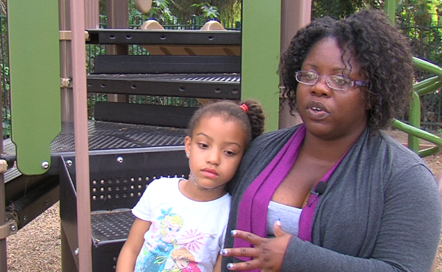 Rhonda Edwards and her daughter Lyric at Operation Hope's emergency homeless shelter in Vista, Dec. 9, 2015.