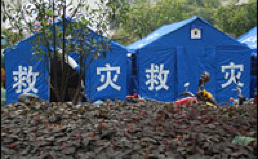 Disaster relief tents have been set up by the government to provide shelter.