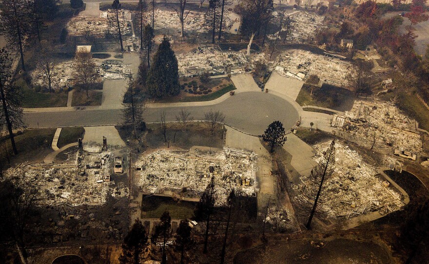 Residences leveled by the Camp Fire line a cul-de-sac in Paradise, Calif., Nov. 2018.