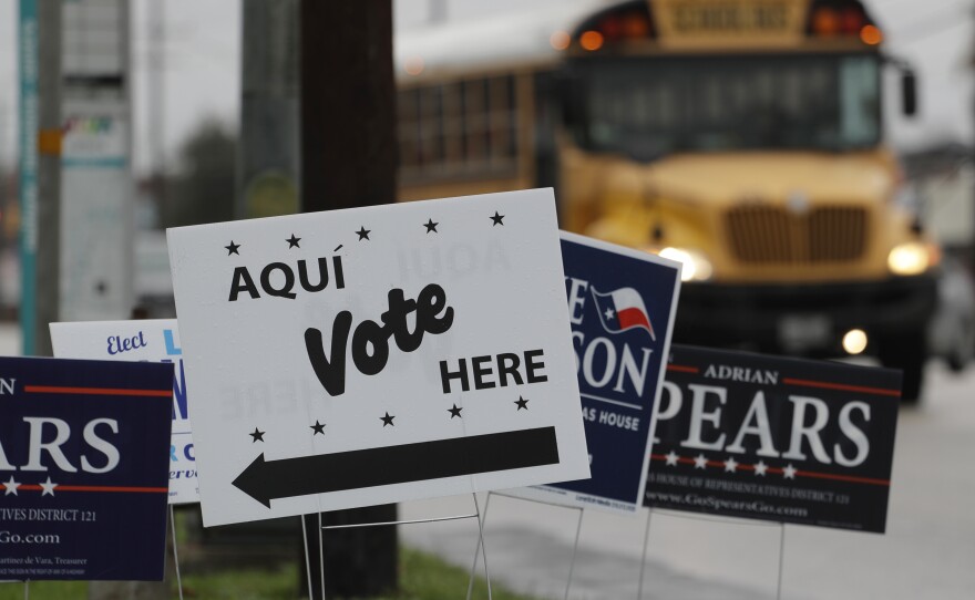 Signs mark a polling site as early voting begins began on Feb. 20 in San Antonio. Early voting in Texas ran through last Friday, March 2.
