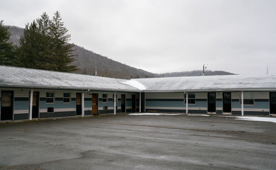 Nearly five years after a destructive flood, many storefronts in Rainelle, W.Va., are empty. Some businesses, like this motel, closed and were unable to reopen. West Virginia state Sen. Stephen Baldwin, who represents Rainelle, says the lack of affordable flood insurance was "catastrophic" for the town. Overhauling federal flood insurance rules could be a lifeline for such towns.