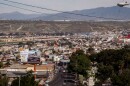 View of Tijuana, the border and San Ysidro from a Tijuana apartment building managed by real estate agent Gustavo Chacon Aubanel, March 2, 2022.