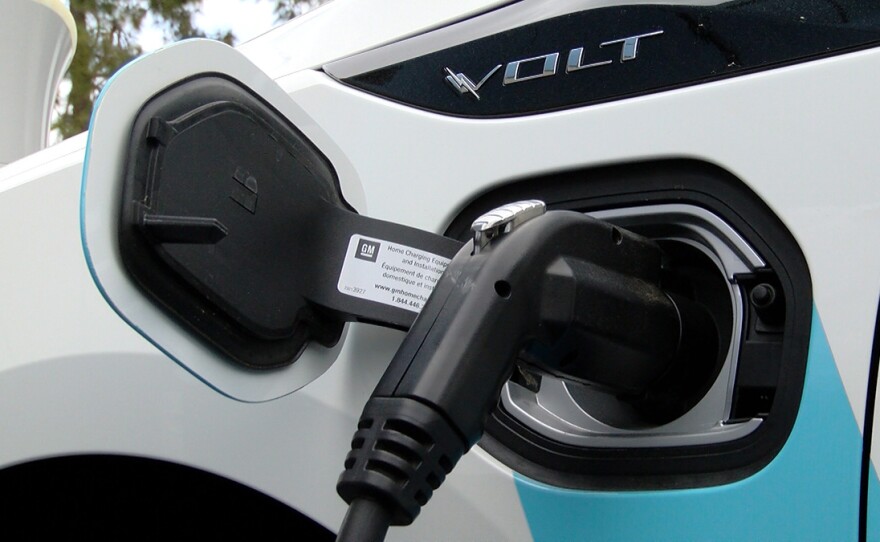 An electric vehicle is being charged, March 28, 2016.