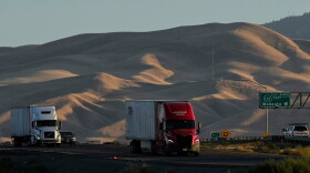 Freight trucks travel northbound on Interstate 5 Highway in September 2025, in Tracy, Calif.