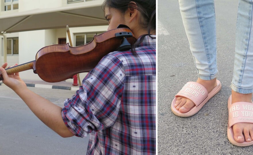 Eighteen-year-old Sevinch plays a borrowed violin in Doha, two days before boarding a flight to her new life in Portugal. She has studied the violin since she was 10.