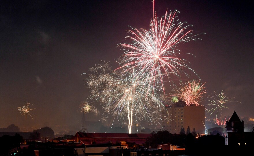 People set off consumer aerial fireworks last July Fourth in Reading, Pa.