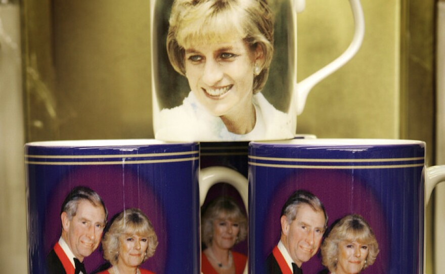 A mug with a photo of the late Princess Diana was among the souvenirs that lined a London storefront ahead of Prince Charles' 2005 wedding to Camilla Parker-Bowles. For Charles and Diana's 1981 wedding, Britain exported an estimated $156 million worth of commemorative trinkets.