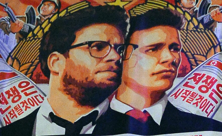 A poster for The Interview. Some theaters now say they will show the comedy, which Sony Pictures had pulled following threats.