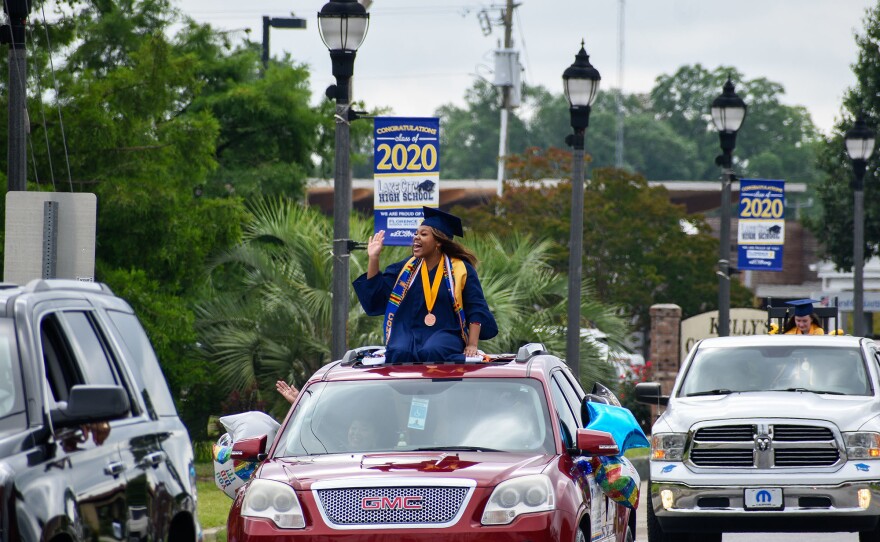 Valedictorian Kimani Ross leads the Lake City High School parade through downtown Lake City, SC.