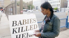 At a Pennsylvania abortion clinic, women face unplanned pregnancies and protesters outside. This is Dr. Monique Ruberu, a pro-life OBGYN. She prays outside the clinic on most Saturdays and considers herself a sidewalk counselor, offering information to women as they enter the clinic for abortion services.