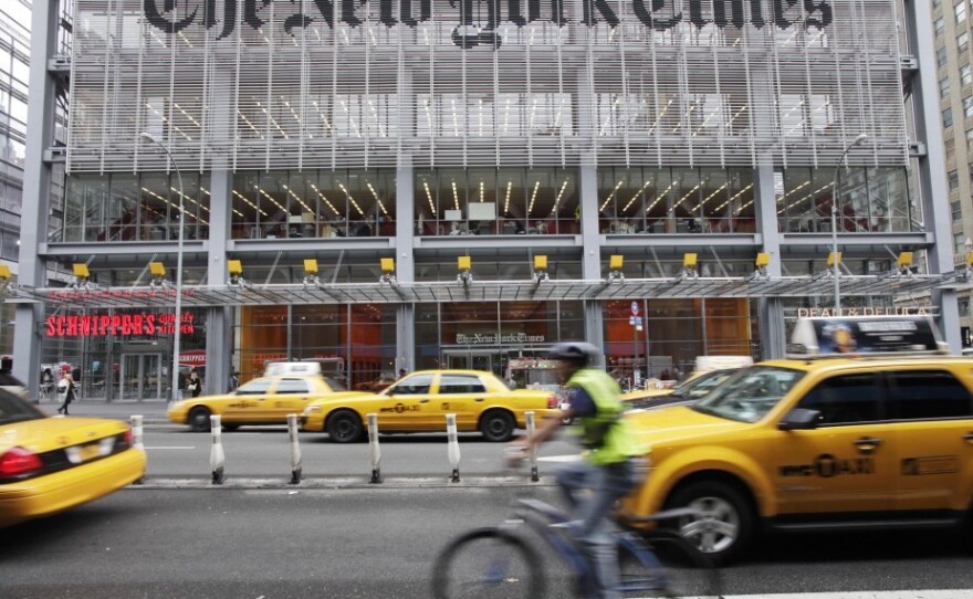 <p><em>The New York Times</em>' move to install a pay wall in March was seen as risky, but the paper's profits and its digital subscribers are up, according to third-quarter profit reports.</p>