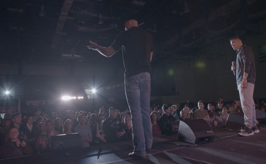 Anthony Pettis and Donald “Cowboy” Cerrone address the crowd at Joint Base Elmendorf, Alaska.