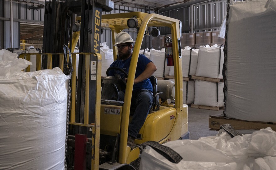Sacks of lithium carbonate are moved in the shipping warehouse at Silver Peak lithium mine in Silver Peak, Nev. on Oct. 6, 2022.