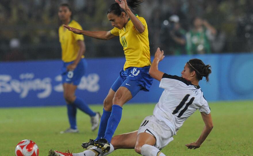 Lloyd has helped the U.S. women continue a dominant run on the world stage. She's seen here trying to spring the ball away from Brazil's Marta in the gold medal match of the 2008 Beijing Olympics.