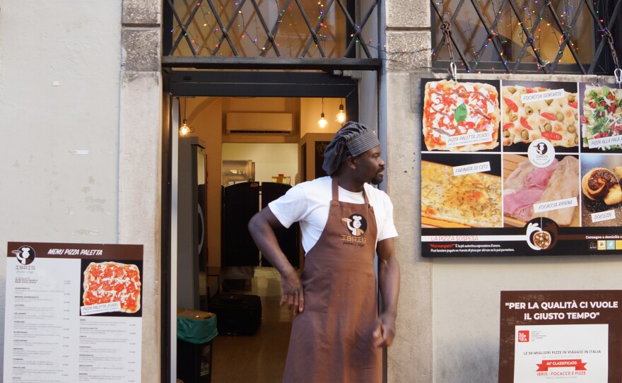 "Once they taste my pizza, all judgment disappears," says Ibrahim Songne.