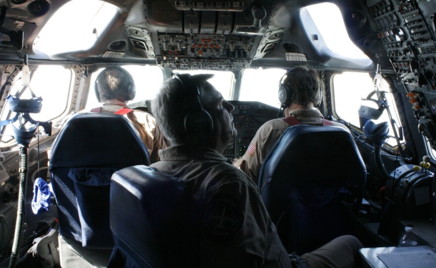 NASA scientists measure air quality aboard one of NASA's three "flying air quality labs" over the Korean peninsula in April.