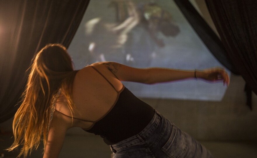 Akron is one of four cities trying to inject playfulness and joy into the act of voting through activities such as "virtual wrestling."