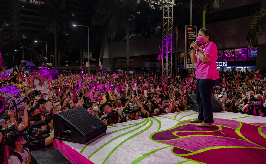 Vice President Leni Robredo takes part in a rally in March. Robredo is behind in polls but her numbers have risen dramatically in the most recent polling.