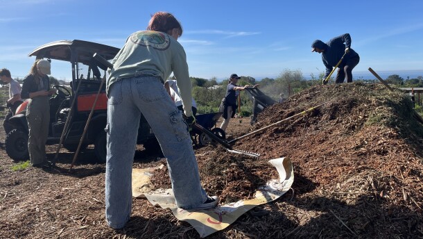 The Grauer School students move mulch at Coastal Roots Farm, Jan. 20, 2026.