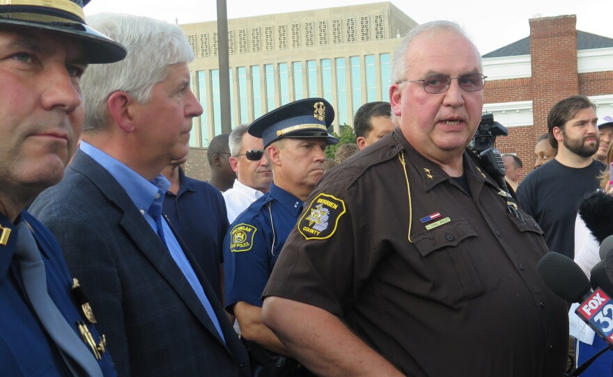 Berrien County, Mich., Sheriff Paul Bailey says a prisoner disarmed an officer, shot and killed two bailiffs and wounded a deputy sheriff Monday at the county courthouse before officers killed the gunman.