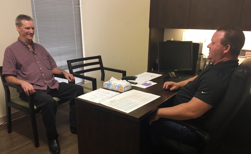 David Woodside visits David Yarborough's office several times a week to get helpful coaching on how to manage the symptoms of his bipolar and schizoaffective disorder. "Dave's been through a lot of the things I've been through — and vice versa," Woodside says.