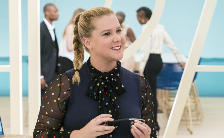Amy Schumer stars as a woman who acquires a boost of self-confidence after a bump on the head in <em>I Feel Pretty</em>.