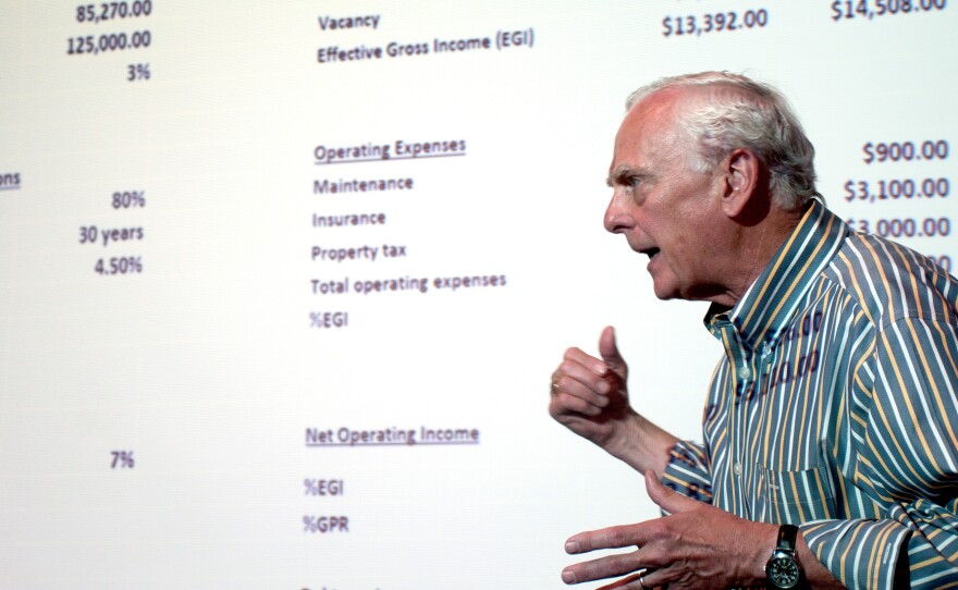 University of Michigan professor Peter Allen lectures to students during his real estate investing course.