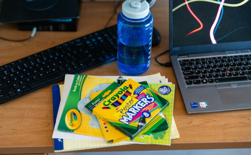Ashley Close keeps a coloring book and markers on her desk to entertain young patients while she meets with their parents and doctors. Close works out of an office at Children's National's Anacostia clinic in Washington, D.C., so she can work closely with doctors on patients' cases.