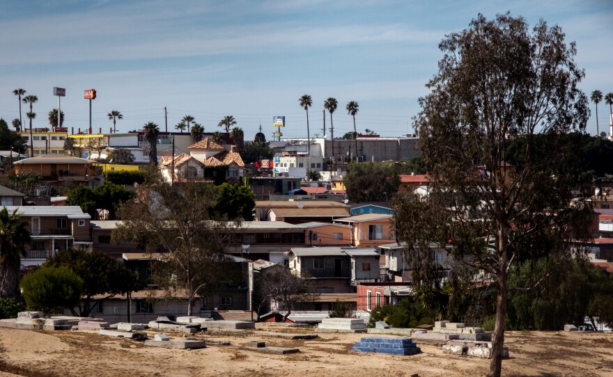 The view of a Tijuana graveyard from the public area of an apartment building managed by real estate agent Gustavo Chacon Aubanel, March 2, 2022.