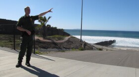 Border Patrol Agent Jerry Conlin at Border Field State Park, the most southwestern most point of the U.S.