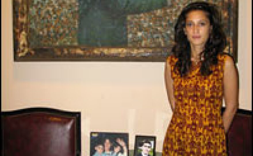 Fatima Bhutto stands in front of a painting of her grandfather, Zulfikar Ali Bhutto, a former Pakistani prime minister who was executed in 1979.