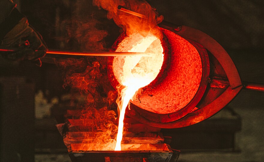 The nearly 10,000 pound Robert E. Lee Confederate statue, broken into pieces, is turned to molten bronze and poured into ingot molds.