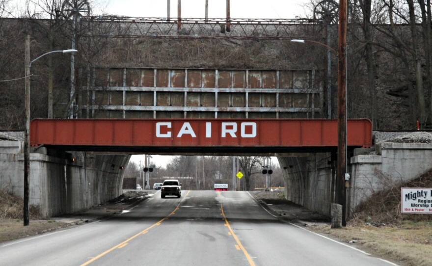 A big, metal gate designed in 1914 to protect Cairo, Ill., from flood waters marks the entrance to the town. Today, Cairo's population has dwindled to about 2,800 due in large part to floods, evacuations and a suffering economy.