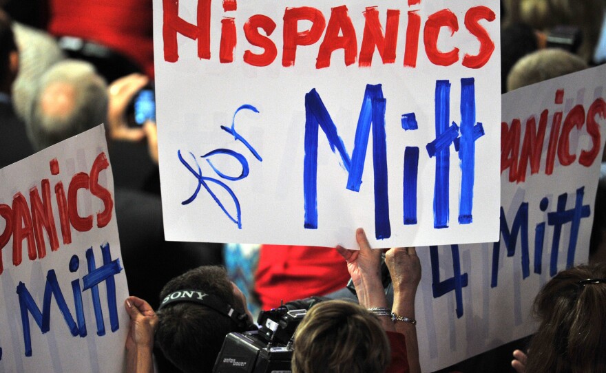 Delegates wave banners during Mitt Romney's acceptance speech at the Republican National Convention in August.
