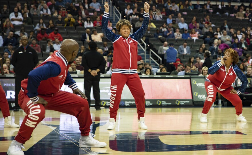 "Nana," 76 (center), is the oldest member of Wizdom.