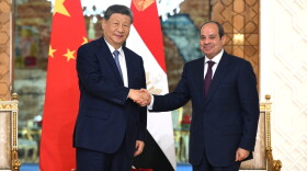 In this photo released by Xinhua News Agency, visiting Chinese President Xi Jinping, left, shakes hands with Egyptian President Abdel-Fattah el-Sissi prior to their meeting in Cairo, Egypt, Wednesday, Sept. 2, 2026.