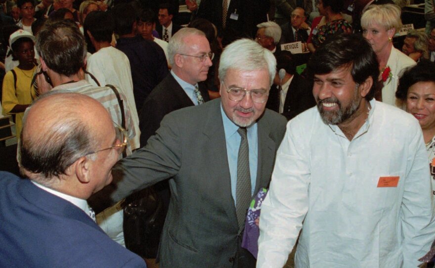 Kailash Satyarthi (in while) greets U.N. officials at a meeting in Geneva in 1998.