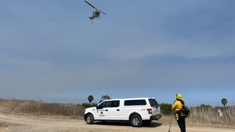 Ground and air crews work to put out the November Fire on Camp Pendleton on June 10, 2026.