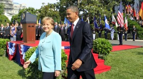 U.S. President Barack Obama (R) and German Chancellor Angela Merkel walk off the podium during a welcoming ceremony on the South Lawn of the White House June 7, 2011 in Washington, DC. 