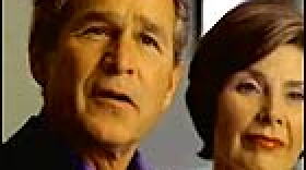 President Bush and First Lady Laura Bush in one of the new Bush re-election campaign ads.