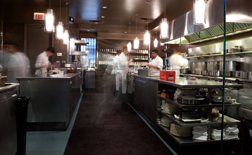 A peek inside the kitchen of NEXT, run by Chef Ludo Lefebrve, an early adopter of the ticket system that's replacing reservations at some restaurants.