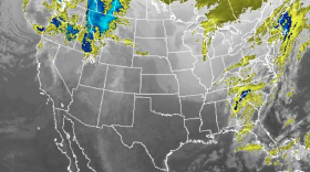 This satellite image shows a storm system brewing in the northwest, with clear skies over Southern California due to a strong ridge of high pressure, Feb. 9. 2015.