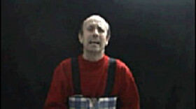 BBC Gaza correspondent Alan Johnston appears wearing a body belt, which he said contained explosives, in this image taken from a short video  released by his kidnappers on June 25, 2007.