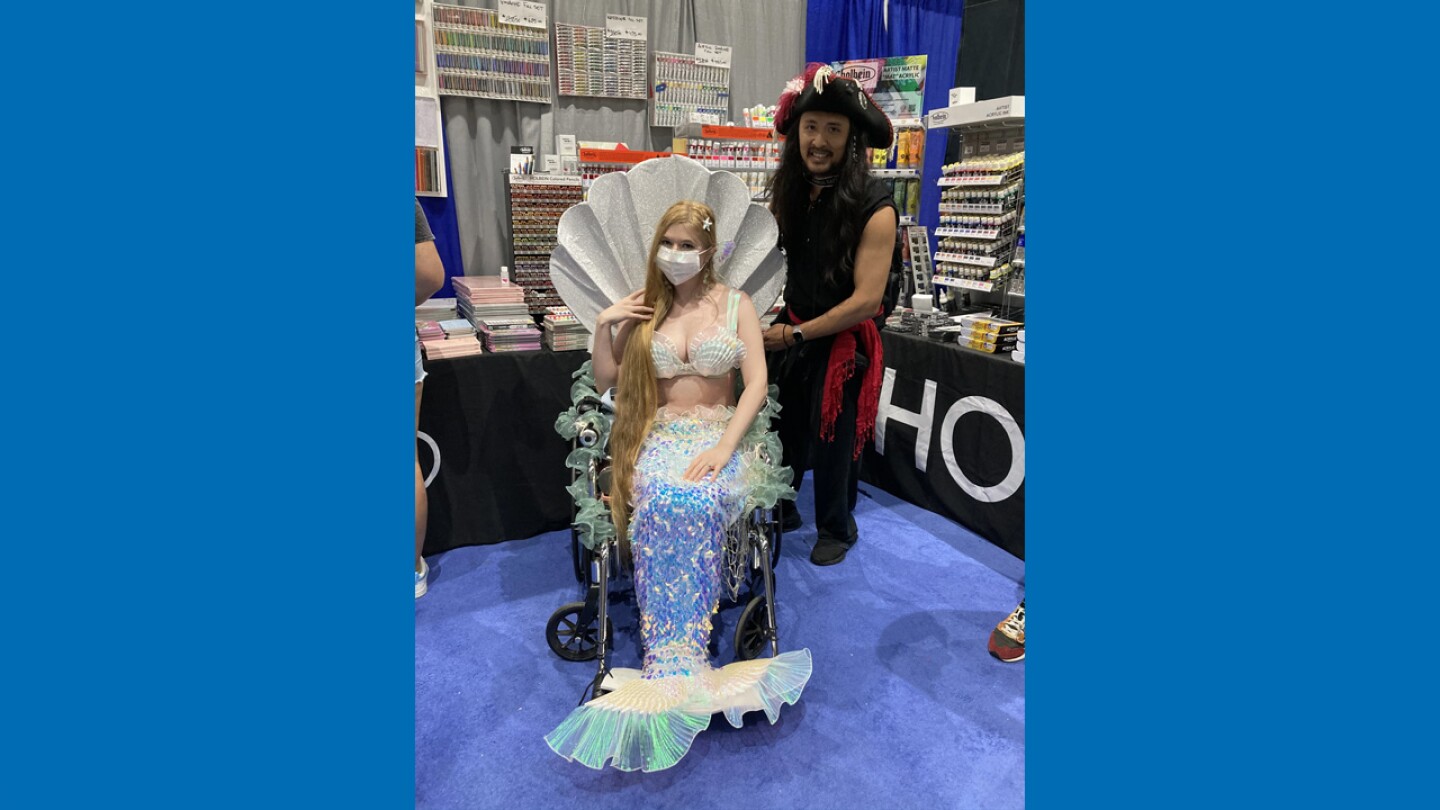 Maria Egger (left) and Tony L. Le attend Comic-Con as mermaid and pirate on July 26, 2024.