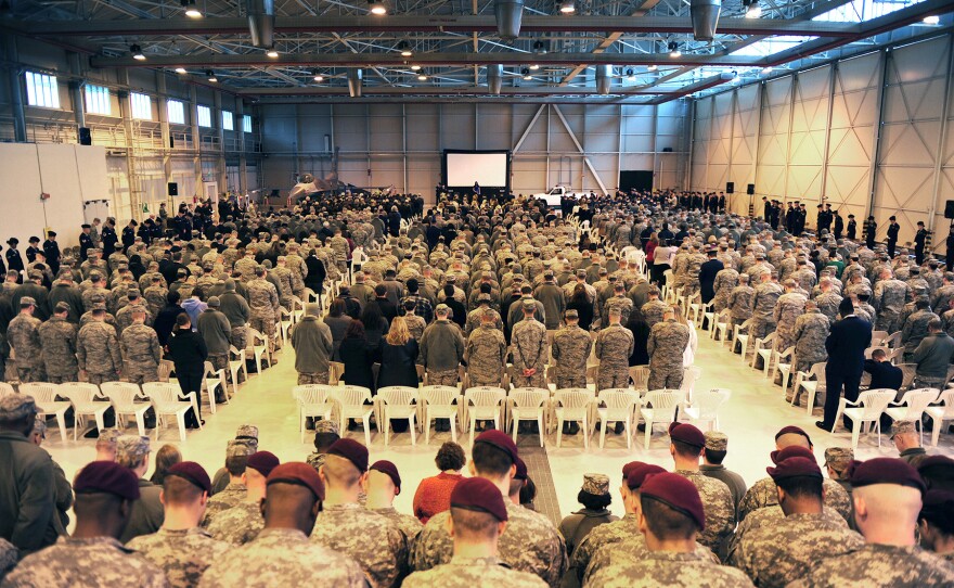 A memorial service for Maj. Lucas Gruenther is held in a hangar on Aviano Air Base, Italy, Feb. 6, 2013. 