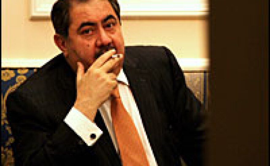 Iraqi Foreign Minister Hoshyar Zebari, shown last week, tried to explain the new treaty to angry lawmakers Wednesday before a fight between bodyguards and a lawmaker broke out.