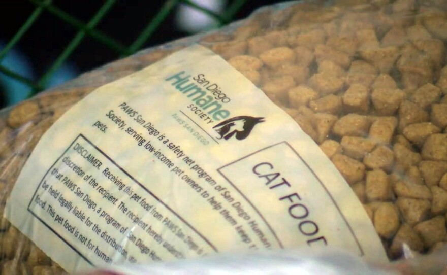 A bag of cat food from the San Diego Human Society. The society was distributing food on March 24, 2020, through its PAWS San Diego pantry program for pet families who need extra help during the COVID-19 pandemic.