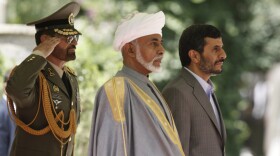 Omani Sultan Qaboos bin Said (center) was the first foreign ruler to visit Iran after the 2009 re-election of Iranian President Mahmoud Ahmadinejad (right).