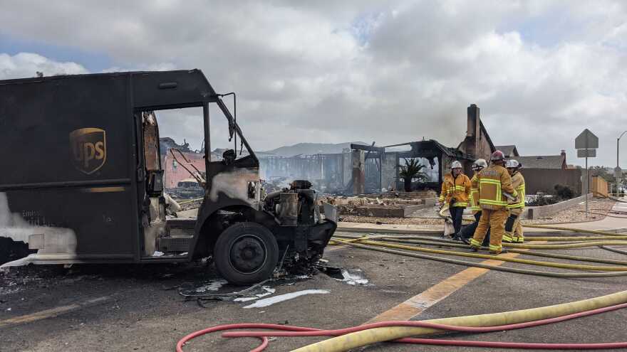 A UPS truck was damaged after plane crashed in Santee, Calif. Oct. 11, 2021.